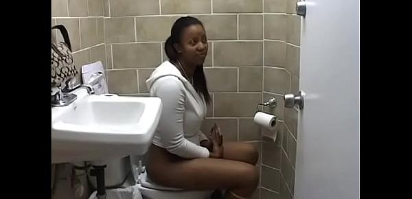  Black beauty takes off her lace panties and pee in the bathroom